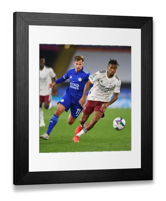 Framed Print : Reiss Nelson vs Marc Albrighton: A Carabao Cup Showdown - Leicester City vs Arsenal Framed Print : Reiss Nelson vs Marc Albrighton: A Carabao Cup Showdown - Leicester City vs Arsenal