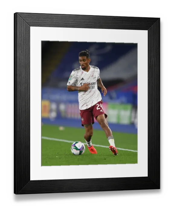 Framed Print : Arsenal's Reiss Nelson Goes Head-to-Head with Leicester City in Carabao Cup Clash Framed Print : Arsenal's Reiss Nelson Goes Head-to-Head with Leicester City in Carabao Cup Clash