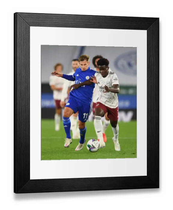 Framed Print : Bukayo Saka vs Marc Albrighton: A Fight for Supremacy in the Carabao Cup Showdown at The King Power Stadium Framed Print : Bukayo Saka vs Marc Albrighton: A Fight for Supremacy in the Carabao Cup Showdown at The King Power Stadium