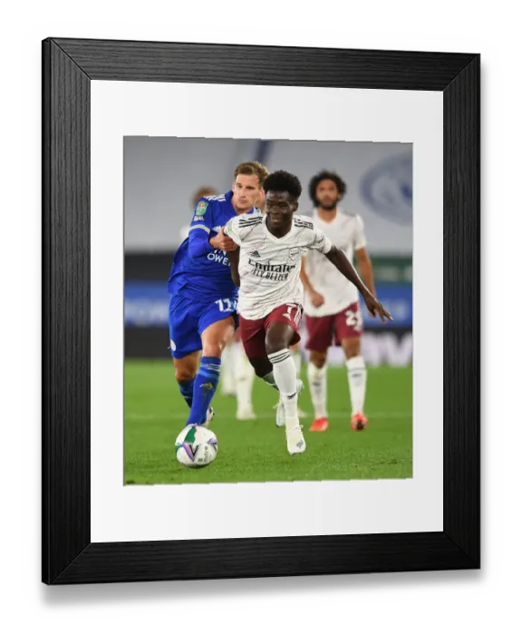 Framed Print : Saka vs Albrighton: A Football Battle at The King Power Stadium - Carabao Cup 2020-21
