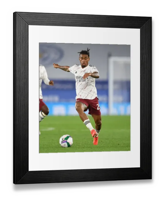Framed Print : Arsenal's Reiss Nelson Faces Off Against Leicester City in Carabao Cup Clash