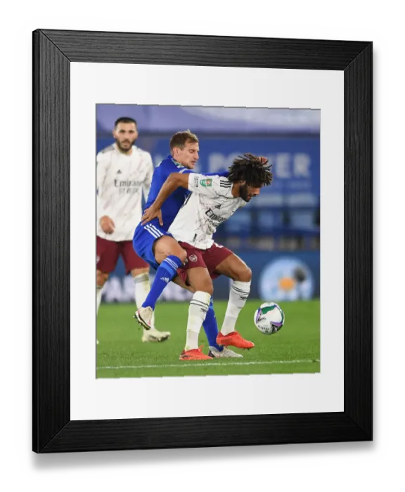 Framed Print : Mohamed Elneny vs Marc Albrighton: A Battle in the Carabao Cup Third Round between Leicester City and Arsenal Framed Print : Mohamed Elneny vs Marc Albrighton: A Battle in the Carabao Cup Third Round between Leicester City and Arsenal