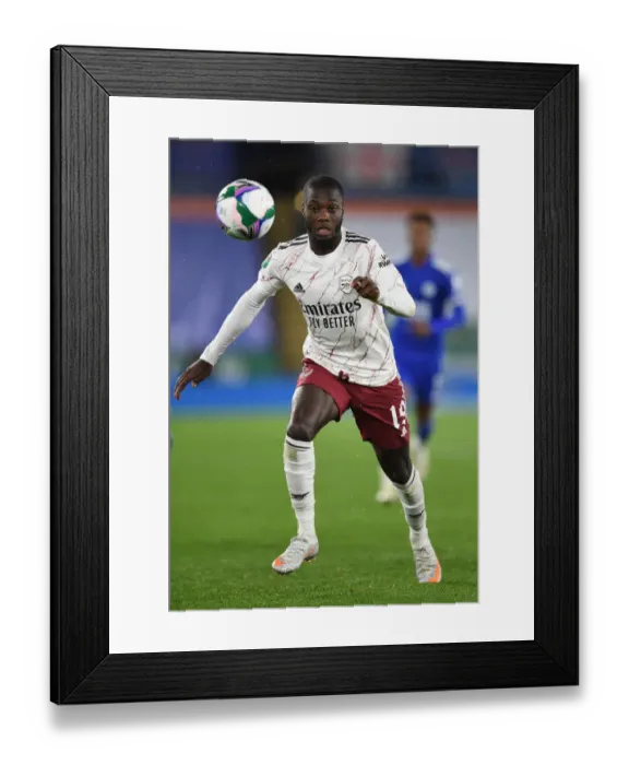 Framed Print : Pepe Leads Arsenal in Carabao Cup Clash against Leicester City