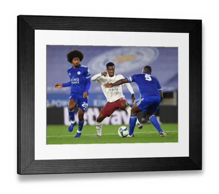 Framed Print : Leicester City vs. Arsenal: Eddie Nketiah Clashes with Hamza Choudhury and Wes Morgan in Carabao Cup Showdown