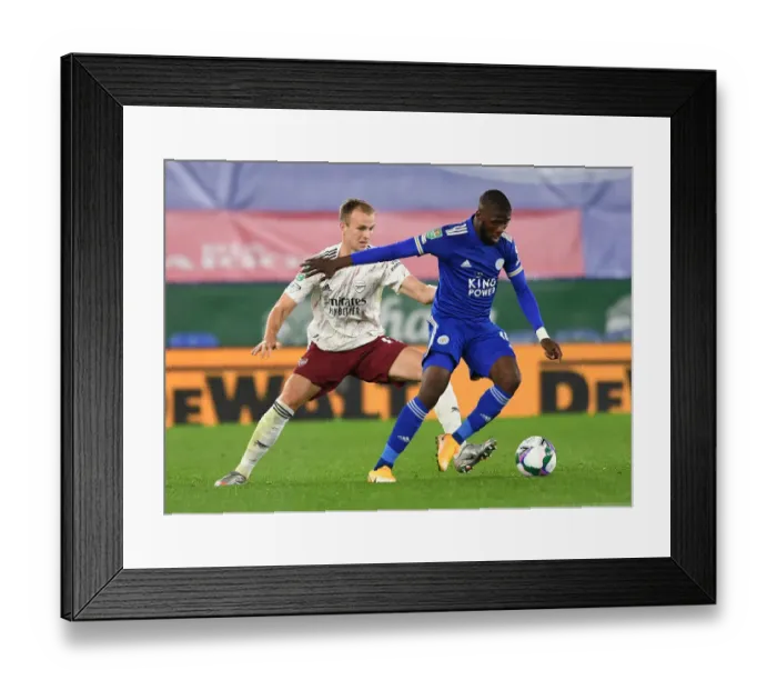 Framed Print : Arsenal's Rob Holding Closes In on Leicester's Kelechi Iheanacho in Carabao Cup Clash Framed Print : Arsenal's Rob Holding Closes In on Leicester's Kelechi Iheanacho in Carabao Cup Clash