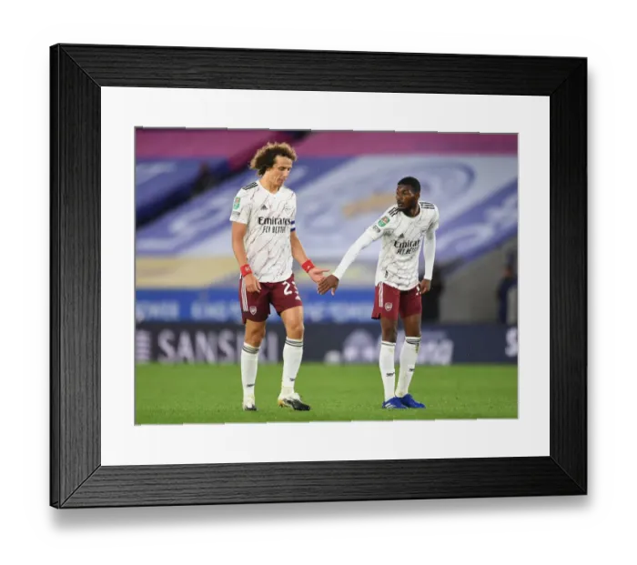 Framed Print : Arsenal's Luiz and Maitland-Niles Face Off Against Leicester City in Carabao Cup Clash