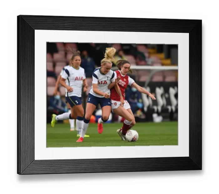 Framed Print : Arsenal vs. Tottenham Women's FA Cup Clash: Evans vs. Peplow Battle at Meadow Park Framed Print : Arsenal vs. Tottenham Women's FA Cup Clash: Evans vs. Peplow Battle at Meadow Park