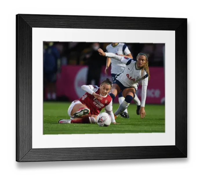 Framed Print : Arsenal vs. Tottenham: A Fierce FA Cup Battle at Meadow Park
