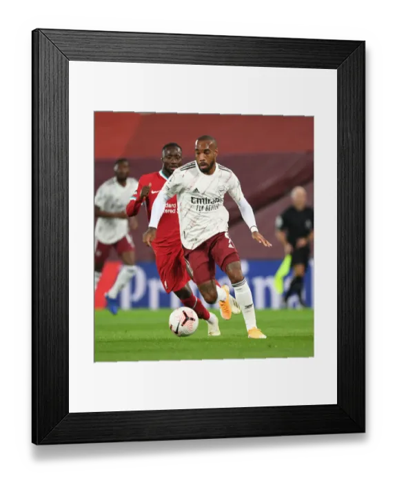 Framed Print : Arsenal's Alex Lacazette at Anfield: Liverpool vs Arsenal, 2020-21 Premier League Framed Print : Arsenal's Alex Lacazette at Anfield: Liverpool vs Arsenal, 2020-21 Premier League