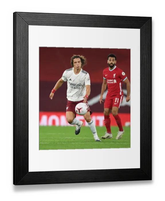 Framed Print : Arsenal's David Luiz at Anfield: Premier League Clash Amidst Empty Stands (Liverpool v Arsenal 2020-21) Framed Print : Arsenal's David Luiz at Anfield: Premier League Clash Amidst Empty Stands (Liverpool v Arsenal 2020-21)