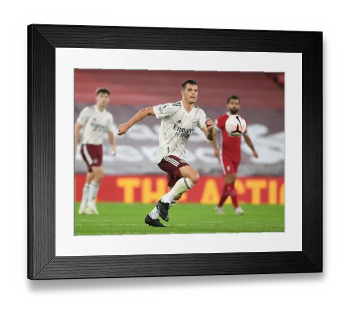 Framed Print : Lone Arsenal Warrior: Granit Xhaka's Battle at Anfield Amidst Liverpool's Roar, 2020-21 Premier League Framed Print : Lone Arsenal Warrior: Granit Xhaka's Battle at Anfield Amidst Liverpool's Roar, 2020-21 Premier League