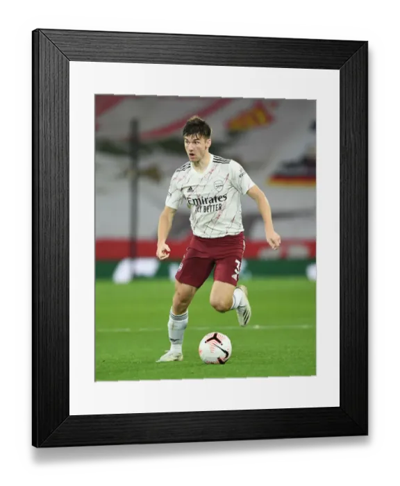 Framed Print : Arsenal's Kieran Tierney Faces Liverpool in Empty Anfield - Premier League 2020-21