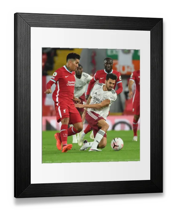 Framed Print : Midfield Showdown: Dani Ceballos vs. Roberto Firmino in Empty Anfield's Premier League Battle (2020-21) Framed Print : Midfield Showdown: Dani Ceballos vs. Roberto Firmino in Empty Anfield's Premier League Battle (2020-21)