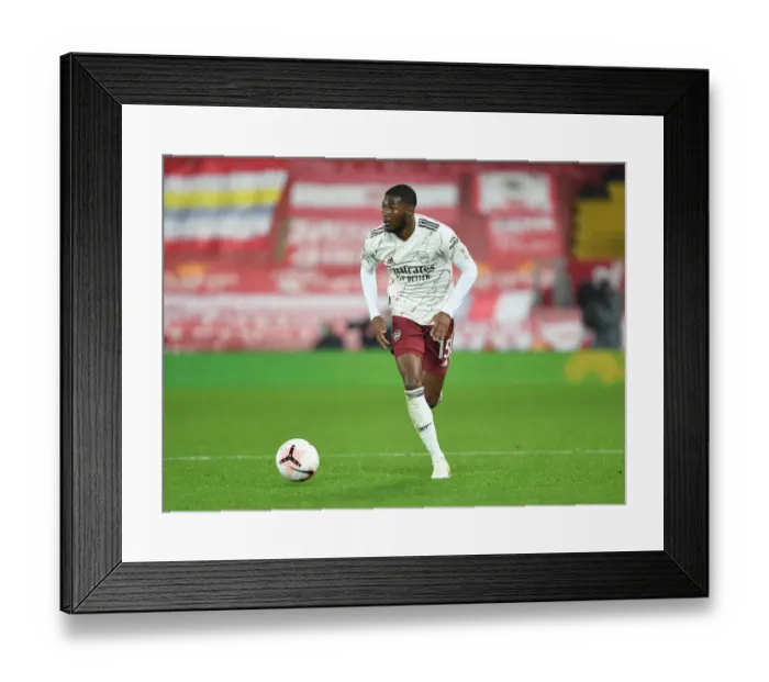 Framed Print : Empty Anfield: Ainsley Maitland-Niles in Action as Liverpool Host Arsenal, 2020-21 Premier League