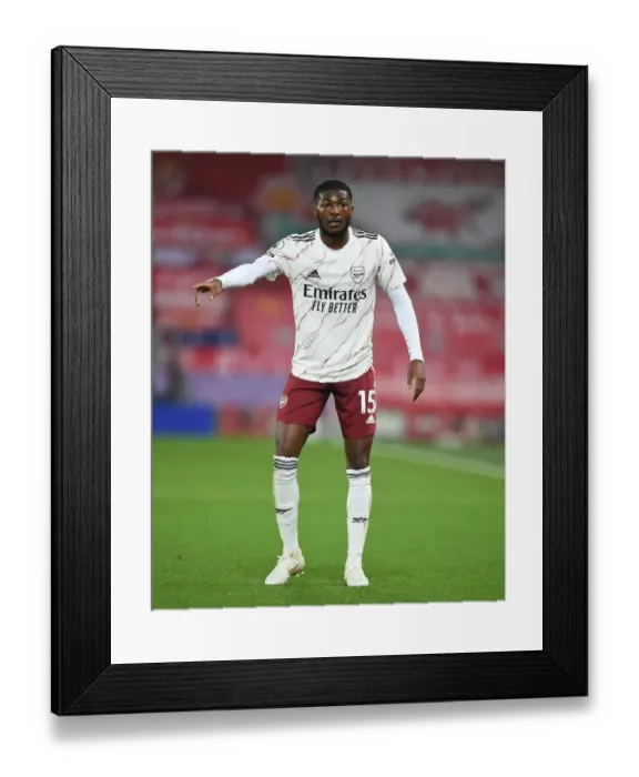 Framed Print : Arsenal's Ainsley Maitland-Niles at Empty Anfield, 2020-21 Premier League