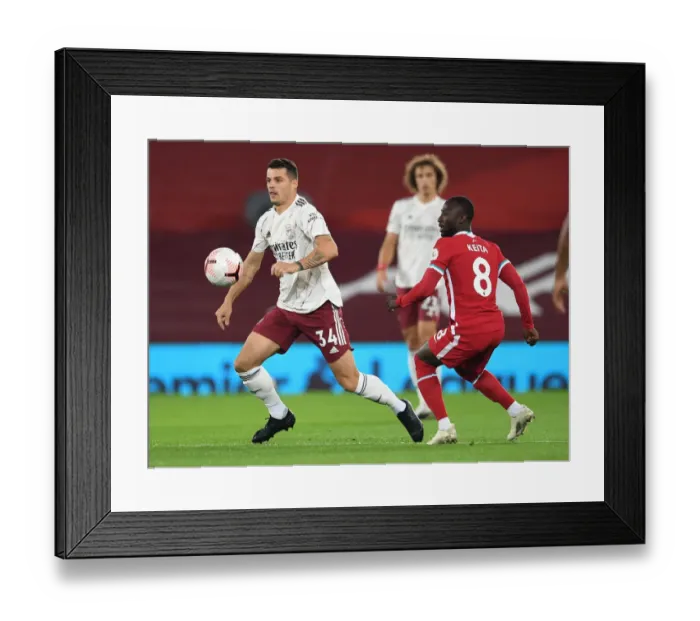 Framed Print : Xhaka vs. Keita: Liverpool vs. Arsenal Clash in Empty Anfield, Premier League 2020-21 Framed Print : Xhaka vs. Keita: Liverpool vs. Arsenal Clash in Empty Anfield, Premier League 2020-21