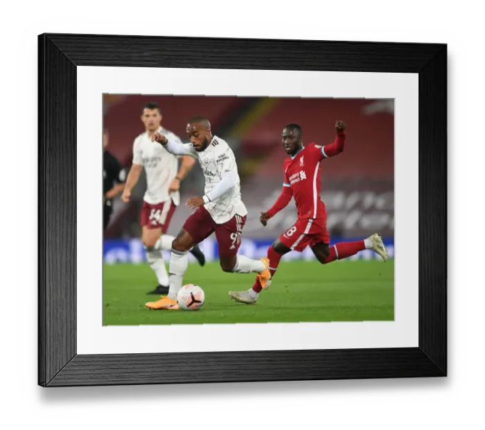 Framed Print : Lacazette vs. Keita: Battle at Anfield - Liverpool vs. Arsenal, 2020-21 Premier League