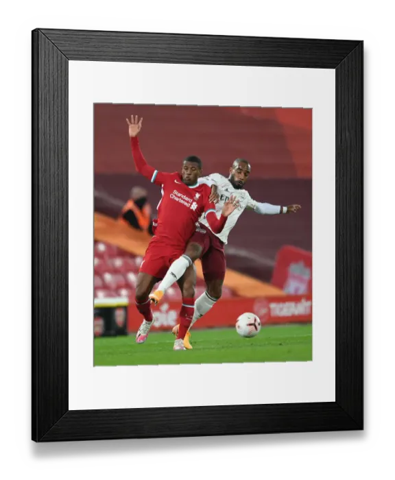 Framed Print : Lacazette vs. Wijnaldum: A Battle at Anfield in the 2020-21 Premier League