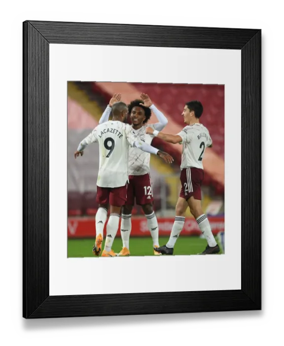 Framed Print : Lacazette's Goal: Liverpool vs. Arsenal in Empty Anfield (2020-21)