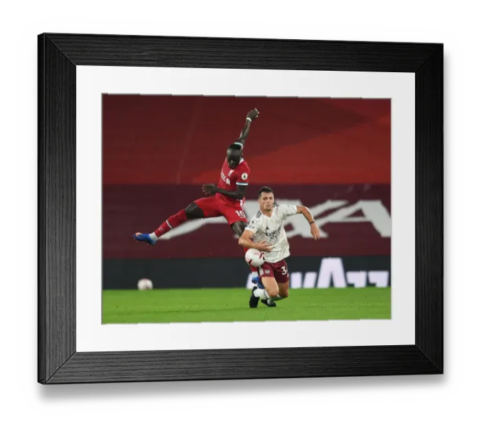 Framed Print : Battle of the Midfield: Xhaka vs Mane - Liverpool vs Arsenal, Premier League 2020-21 (Empty Anfield)