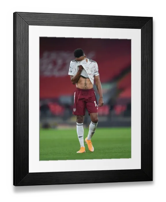Framed Print : Arsenal's Aubameyang Faces Empty Anfield in 2020-21 Premier League Showdown Against Liverpool: A Silent Battle at Anfield Framed Print : Arsenal's Aubameyang Faces Empty Anfield in 2020-21 Premier League Showdown Against Liverpool: A Silent Battle at Anfield