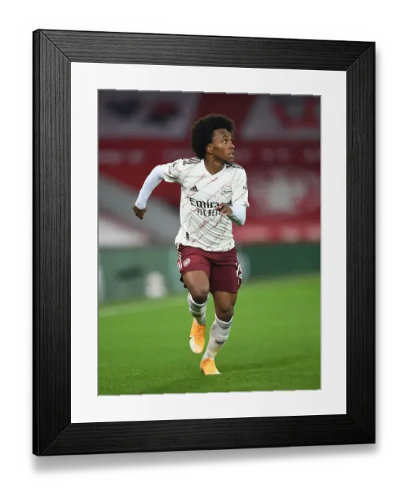 Framed Print : Willian's Silent Struggle: Arsenal vs. Liverpool at Anfield in the 2020-21 Premier League