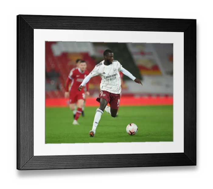 Framed Print : Pepe's Intense Focus: Liverpool vs Arsenal, Empty Anfield, 2020-21 Premier League
