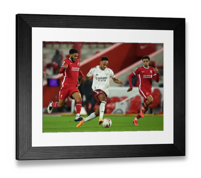 Framed Print : Battle at Anfield: Aubameyang vs. Gomez in the Empty Stands - Liverpool vs. Arsenal, 2020-21 Premier League Clash Framed Print : Battle at Anfield: Aubameyang vs. Gomez in the Empty Stands - Liverpool vs. Arsenal, 2020-21 Premier League Clash