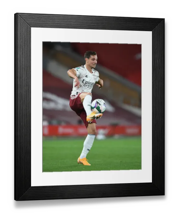 Framed Print : Arsenal's Cedric Faces Empty Anfield in Carabao Cup Clash Against Liverpool