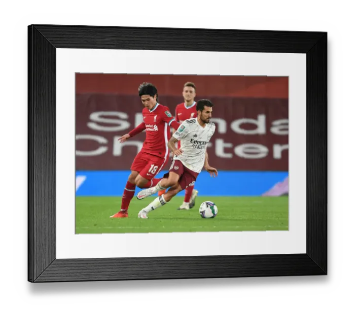Framed Print : Dani Ceballos vs. Takumi Minamino: Empty Anfield Rivals in Carabao Cup Clash
