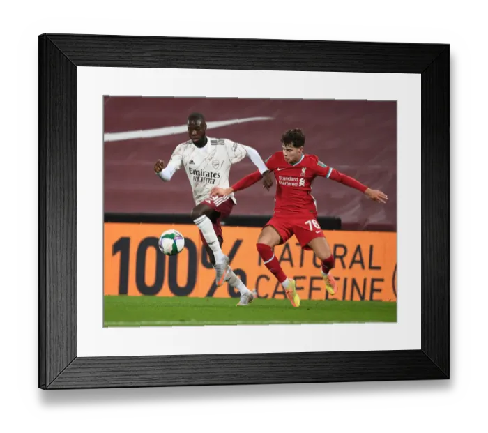 Framed Print : Pepe Breaks Past Williams: Empty Anfield Rivalry - Liverpool vs. Arsenal, Carabao Cup 2020-21 Framed Print : Pepe Breaks Past Williams: Empty Anfield Rivalry - Liverpool vs. Arsenal, Carabao Cup 2020-21