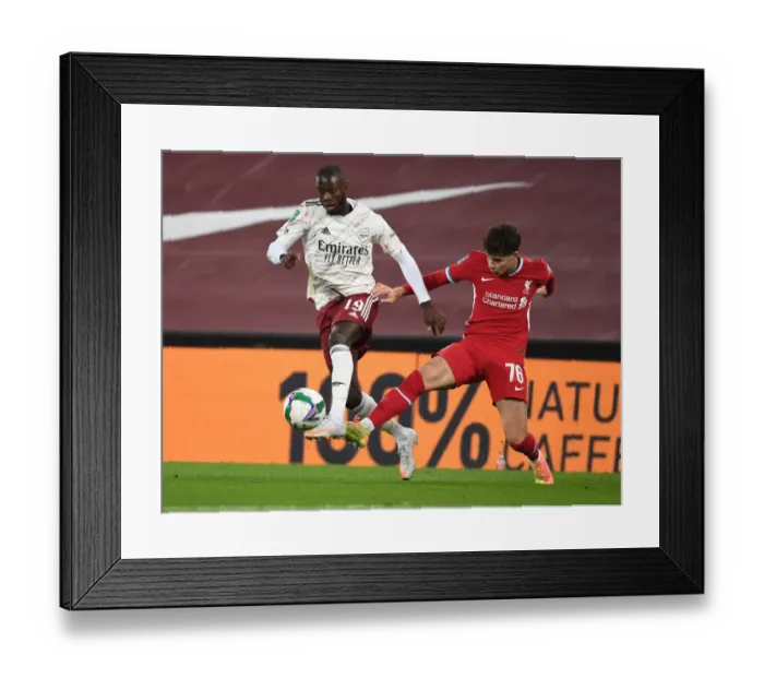 Framed Print : Pepe Breaks Through: Empty Anfield Rivalry - Arsenal vs. Liverpool, Carabao Cup Showdown, 2020-21 Framed Print : Pepe Breaks Through: Empty Anfield Rivalry - Arsenal vs. Liverpool, Carabao Cup Showdown, 2020-21