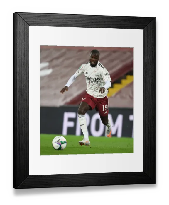 Framed Print : Empty Anfield Showdown: Nicolas Pepe vs. Liverpool in Carabao Cup Amidst Pandemic Framed Print : Empty Anfield Showdown: Nicolas Pepe vs. Liverpool in Carabao Cup Amidst Pandemic