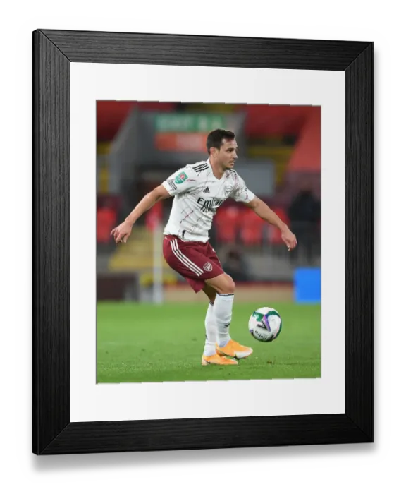Framed Print : Arsenal's Cedric Faces Empty Anfield: Carabao Cup 2020-21 Match Against Liverpool - A Sea of Emptiness