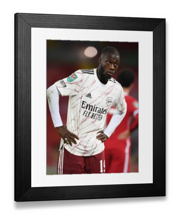 Framed Print : Arsenal's Nicolas Pepe at Empty Anfield: Carabao Cup Clash vs. Liverpool, 2020