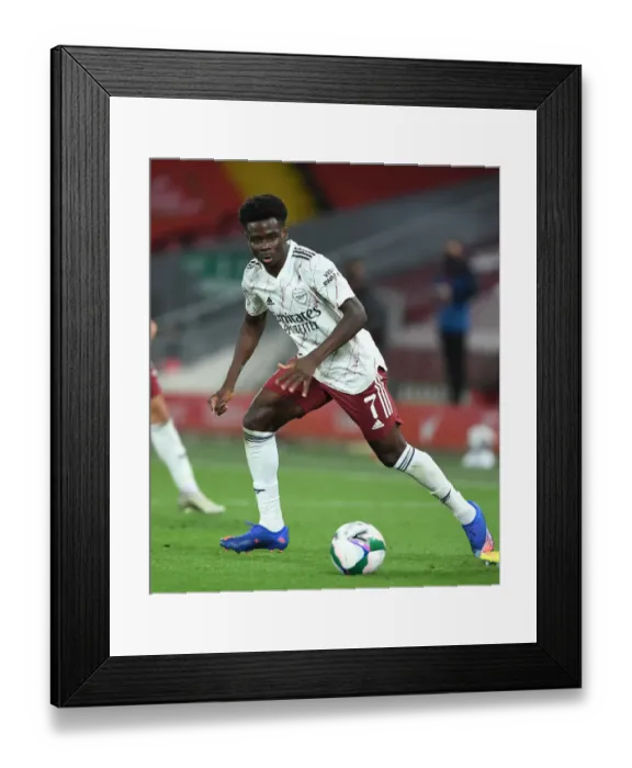 Framed Print : Arsenal's Bukayo Saka at Empty Anfield: Carabao Cup Showdown with Liverpool, 2020