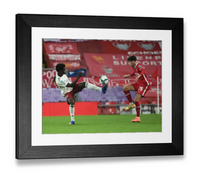 Framed Print : Bukayo Saka vs. Neco Williams: Empty Anfield Rivalry - Carabao Cup 2020-21 Framed Print : Bukayo Saka vs. Neco Williams: Empty Anfield Rivalry - Carabao Cup 2020-21