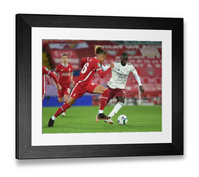 Framed Print : Pepe Breaks Past Williams: Liverpool vs. Arsenal in Carabao Cup Framed Print : Pepe Breaks Past Williams: Liverpool vs. Arsenal in Carabao Cup
