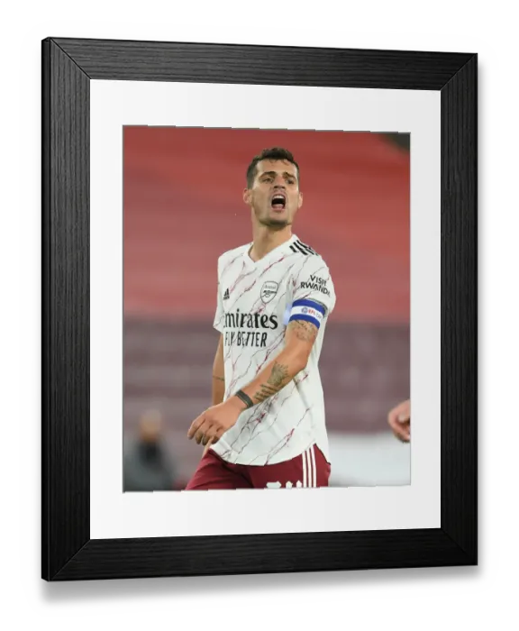 Framed Print : Empty Anfield: Granit Xhaka Leads Arsenal Against Liverpool in Carabao Cup Amidst Pandemic Framed Print : Empty Anfield: Granit Xhaka Leads Arsenal Against Liverpool in Carabao Cup Amidst Pandemic