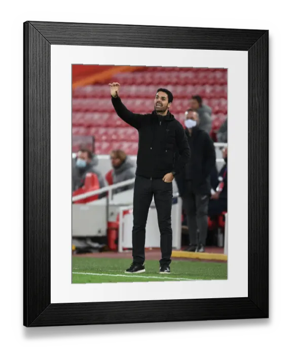 Framed Print : Arsenal's Mikel Arteta at Anfield: Carabao Cup Showdown Against Liverpool (Behind Closed Doors)