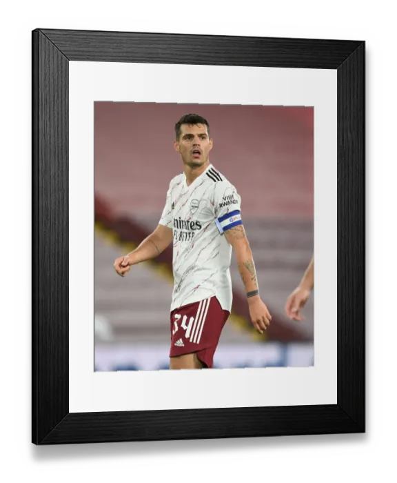 Framed Print : Empty Anfield: Liverpool vs. Arsenal - Carabao Cup Showdown with Xhaka Framed Print : Empty Anfield: Liverpool vs. Arsenal - Carabao Cup Showdown with Xhaka