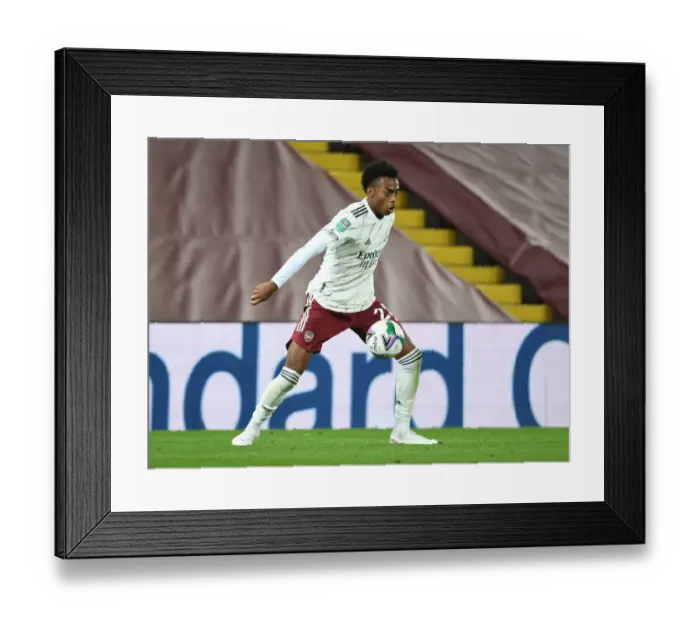 Framed Print : Arsenal's Joe Willock at Empty Anfield: Carabao Cup Battle Against Liverpool Amidst Coronavirus Crisis
