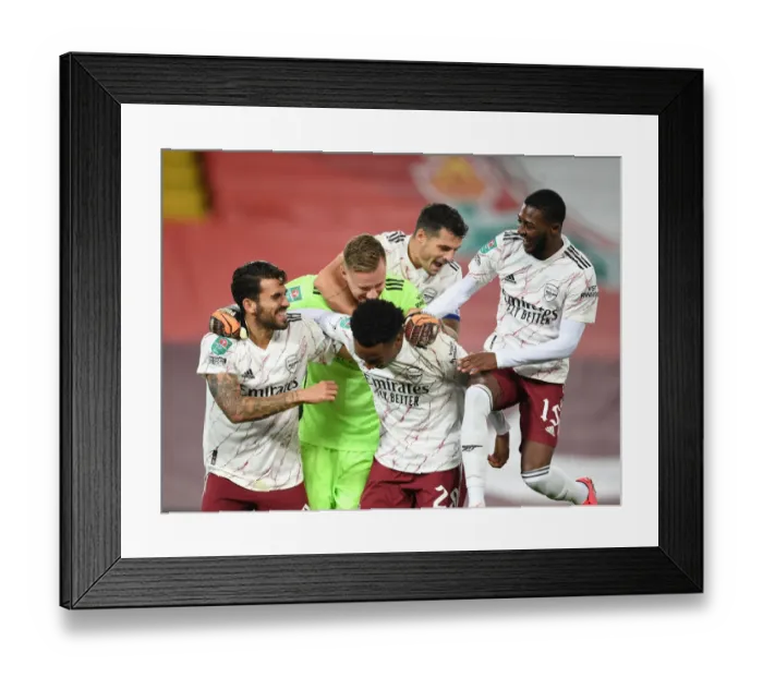 Framed Print : Arsenal's Shock Carabao Cup Victory at Empty Anfield: Celebrating Against Liverpool