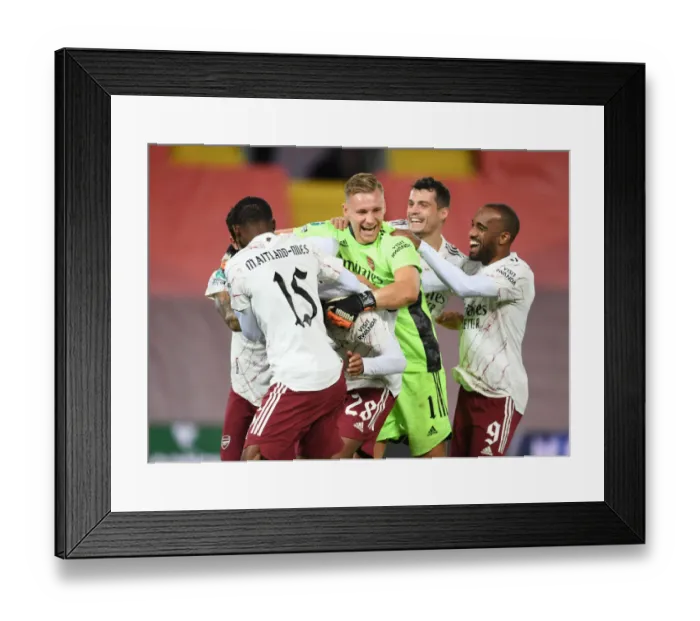 Framed Print : Arsenal Celebrate Carabao Cup Upset Over Liverpool at Empty Anfield Framed Print : Arsenal Celebrate Carabao Cup Upset Over Liverpool at Empty Anfield