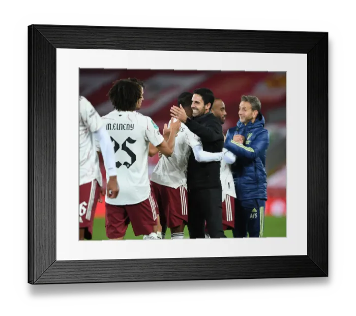 Framed Print : Arteta Embraces Maitland-Niles: Carabao Cup Battle at Empty Anfield - Liverpool vs. Arsenal, 2020