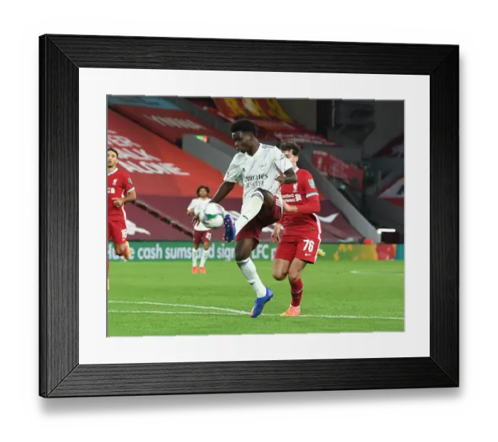 Framed Print : Arsenal's Bukayo Saka at Empty Anfield: Carabao Cup Clash vs. Liverpool, 2020 Framed Print : Arsenal's Bukayo Saka at Empty Anfield: Carabao Cup Clash vs. Liverpool, 2020