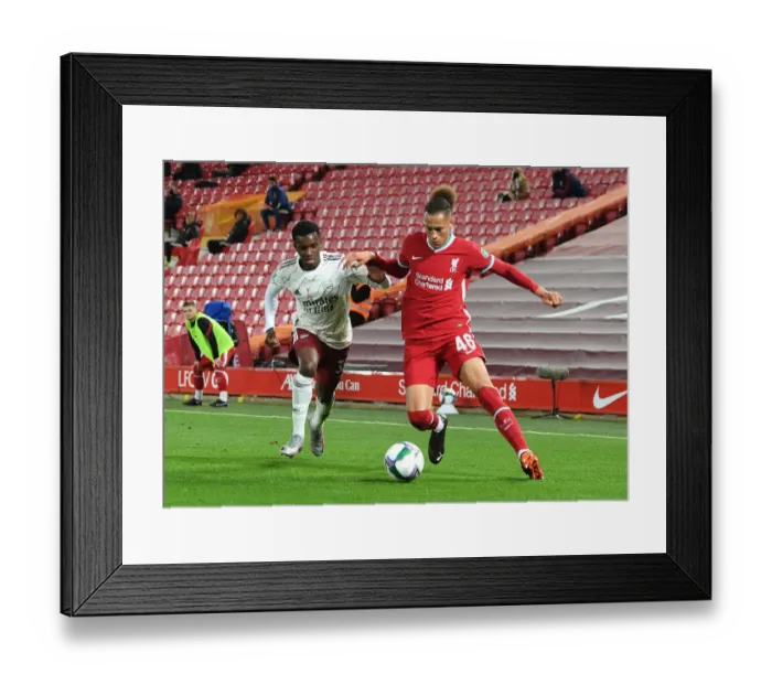 Framed Print : Arsenal vs. Liverpool: Empty Anfield Showdown in Carabao Cup (2020-21) Framed Print : Arsenal vs. Liverpool: Empty Anfield Showdown in Carabao Cup (2020-21)