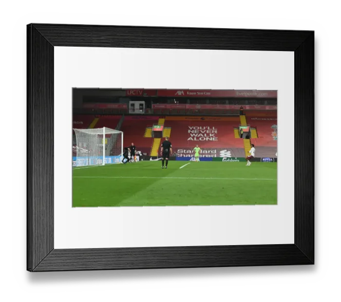 Framed Print : Joe Willock Scores Thrilling Penalty: Arsenal's Upset Win at Empty Anfield Against Liverpool in Carabao Cup 2020-21