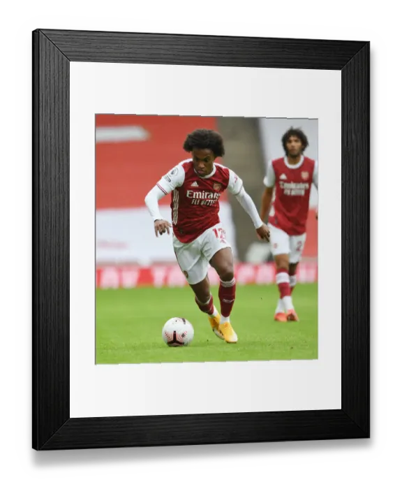 Framed Print : Willian Plays On: Arsenal vs Sheffield United at Empty Emirates Stadium, Premier League 2020-21