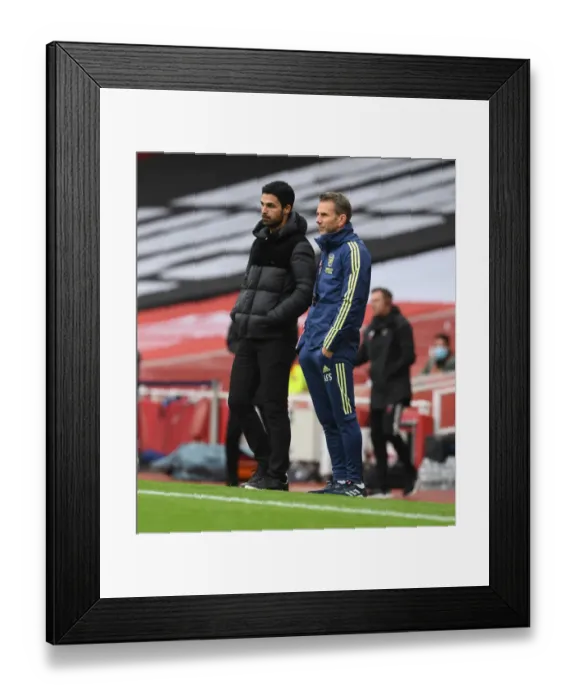 Framed Print : Arsenal vs Sheffield United: Mikel Arteta and Albert Stuivenburg Lead the Empty Emirates Stadium